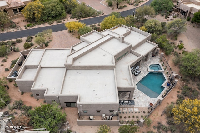 view from above of property featuring a pool area