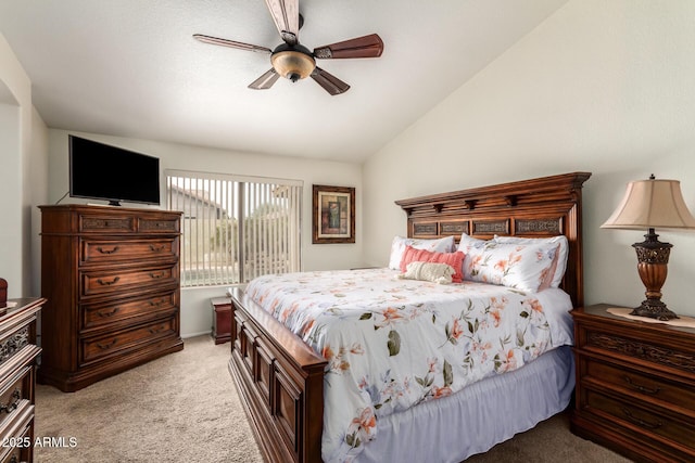 11318 S Hopi Dr, Goodyear, AZ 85338 - bedroom featuring light colored carpet, vaulted ceiling, a ceiling fan, and access to outside