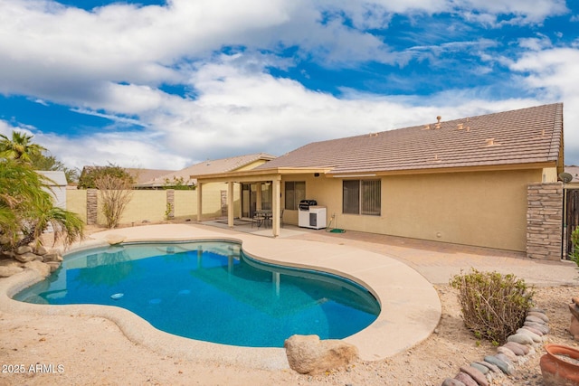 11318 S Hopi Dr, Goodyear, AZ 85338 - view of swimming pool with a fenced backyard and a patio
