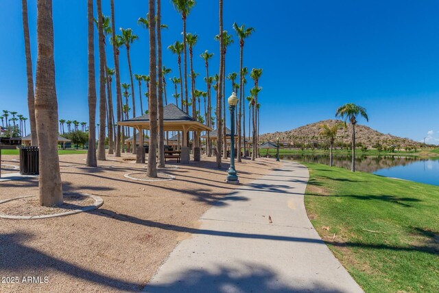 11318 S Hopi Dr, Goodyear, AZ 85338 - view of property's community featuring a gazebo, a water and mountain view, and a lawn
