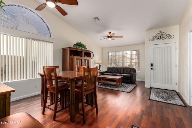 11318 S Hopi Dr, Goodyear, AZ 85338 - dining room with a ceiling fan, lofted ceiling, wood finished floors, and baseboards