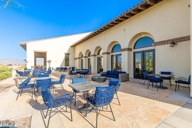 11318 S Hopi Dr, Goodyear, AZ 85338 - view of patio featuring outdoor dining area and an outdoor living space