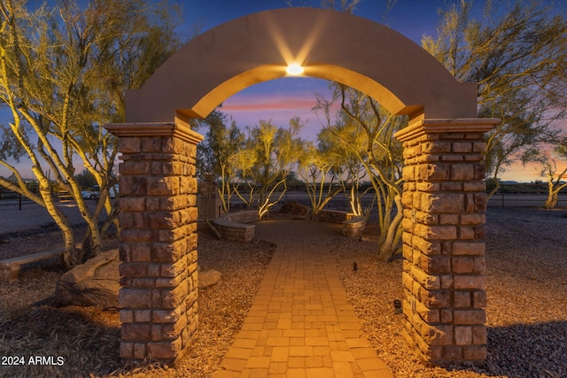 view of patio terrace at dusk