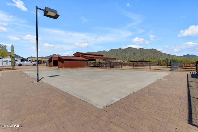 view of patio / terrace with a mountain view