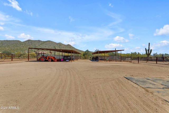 view of property's community with a mountain view and a rural view