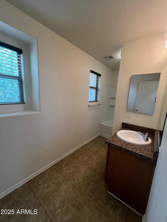 full bathroom with vanity and shower / washtub combination