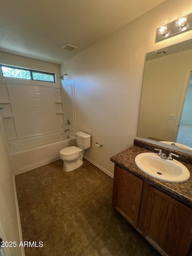 full bathroom featuring tub / shower combination, toilet, vanity, tile patterned flooring, and baseboards