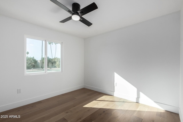 unfurnished room with ceiling fan and hardwood / wood-style floors