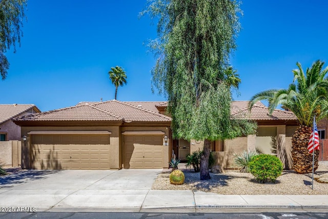 10242 E Pantera Ave, Mesa, AZ 85212 - view of front facade featuring stucco siding, a garage, a tile roof, and driveway