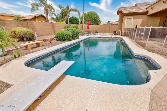 10242 E Pantera Ave, Mesa, AZ 85212 - view of swimming pool featuring a patio, a fenced backyard, and a diving board