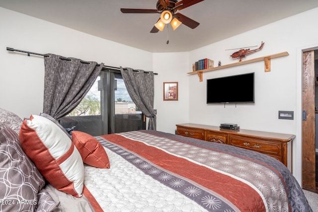 bedroom featuring ceiling fan and access to exterior