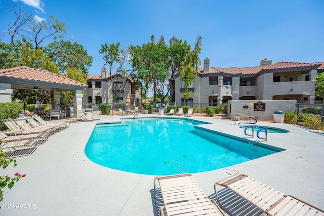 view of swimming pool with a patio