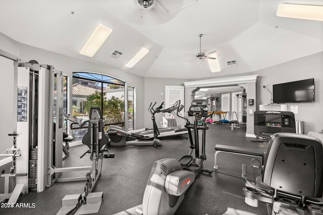 gym with lofted ceiling and ceiling fan