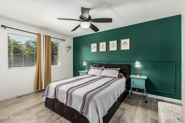 18818 N 12th Ave, Phoenix, AZ 85027 - bedroom featuring wood finished floors and a ceiling fan