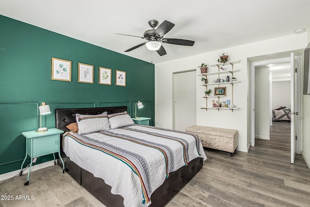 18818 N 12th Ave, Phoenix, AZ 85027 - bedroom with wood finished floors and a ceiling fan