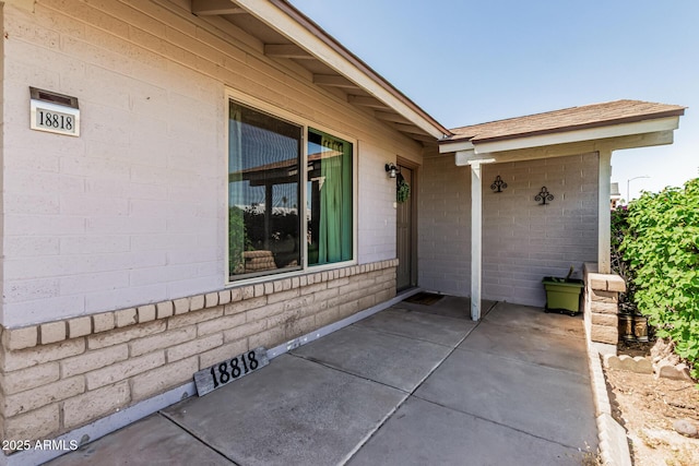 18818 N 12th Ave, Phoenix, AZ 85027 - doorway to property featuring a patio area