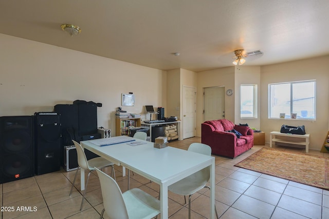 1831 E Pueblo Ave, Phoenix, AZ 85040 - dining room with an office area and light tile patterned floors