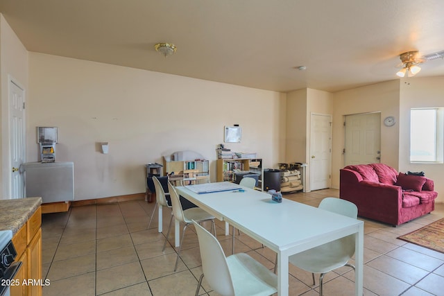 1831 E Pueblo Ave, Phoenix, AZ 85040 - dining space with light tile patterned flooring and a ceiling fan
