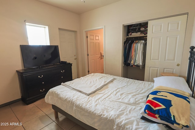 1831 E Pueblo Ave, Phoenix, AZ 85040 - tiled bedroom with a closet and baseboards