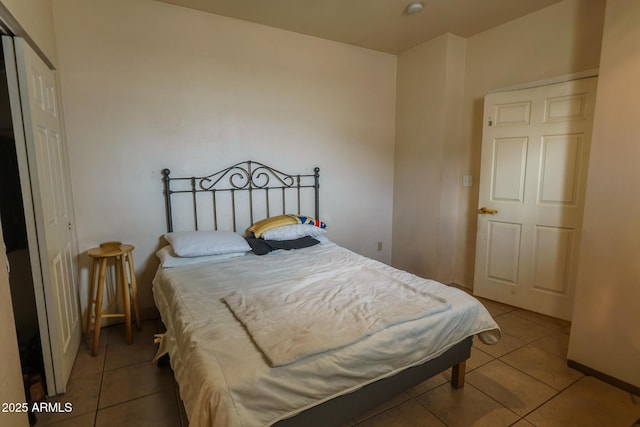 1831 E Pueblo Ave, Phoenix, AZ 85040 - bedroom with tile patterned flooring and baseboards