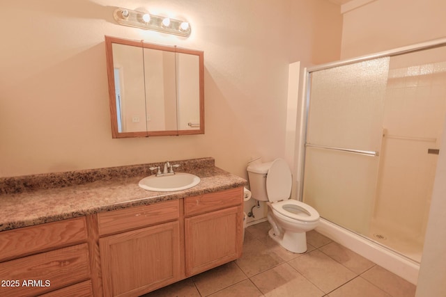 1831 E Pueblo Ave, Phoenix, AZ 85040 - full bath with a stall shower, tile patterned floors, toilet, and vanity