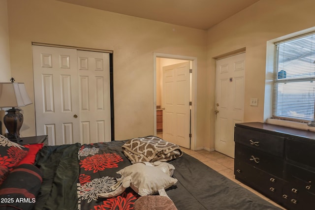 1831 E Pueblo Ave, Phoenix, AZ 85040 - bedroom featuring light tile patterned floors and a closet