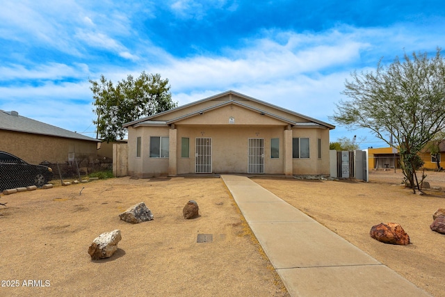 1831 E Pueblo Ave, Phoenix, AZ 85040 - rear view of house featuring fence and stucco siding
