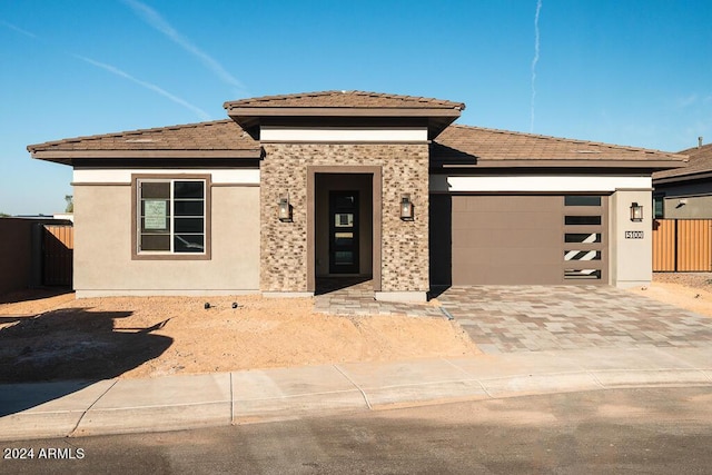 prairie-style house with a garage