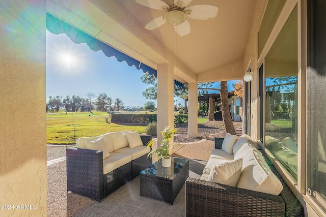 view of patio with ceiling fan and outdoor lounge area