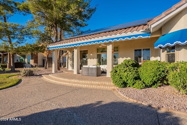 exterior space featuring solar panels