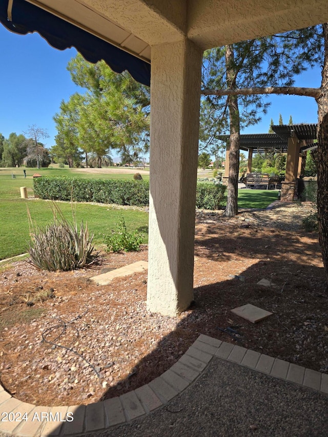 view of yard with a pergola