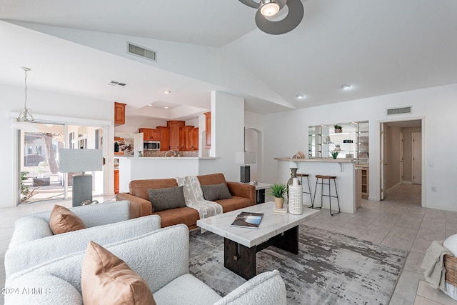 living room featuring vaulted ceiling