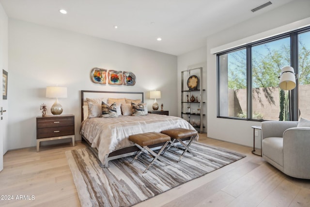 bedroom with light wood-type flooring