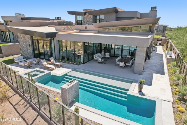 exterior space featuring an outdoor living space and a patio area