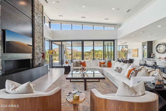 living room featuring a high ceiling