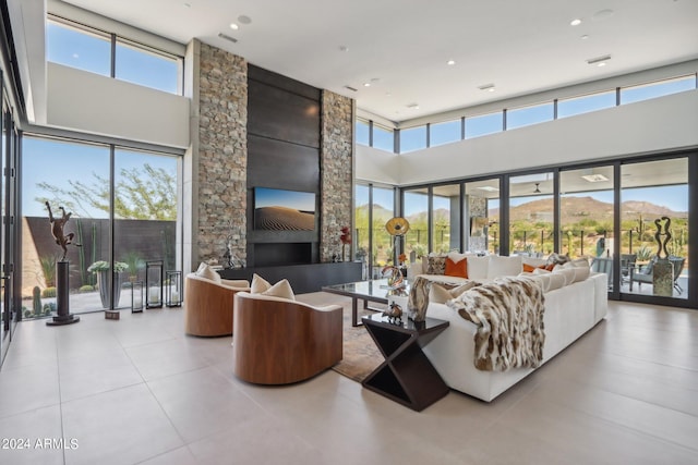 living room featuring a high ceiling