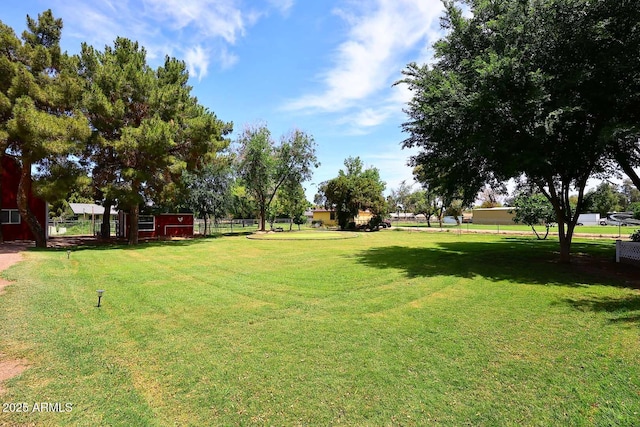 view of yard with fence