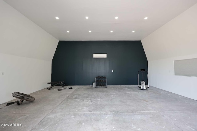 bonus room with recessed lighting and lofted ceiling