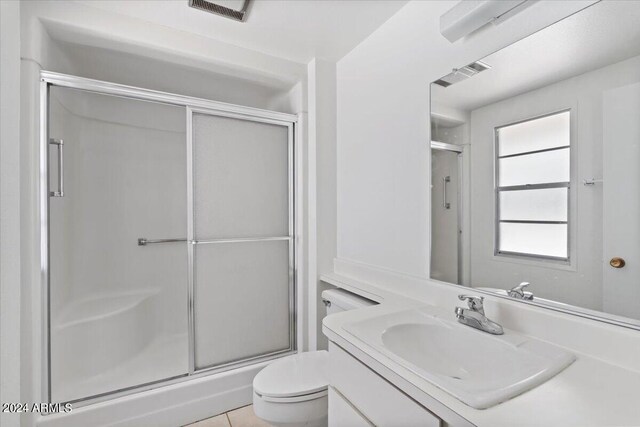 tiled empty room with a textured ceiling and ceiling fan