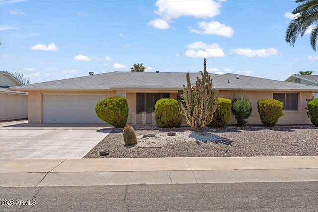 single story home with a garage