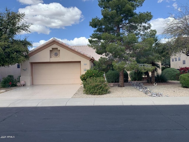 view of front of property with a garage