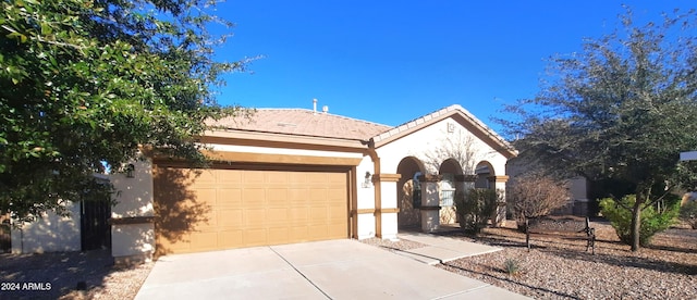 ranch-style home with a garage