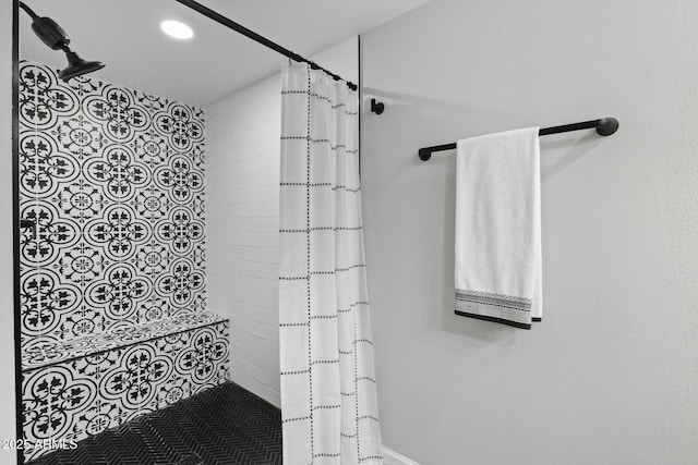 bathroom with a shower with curtain