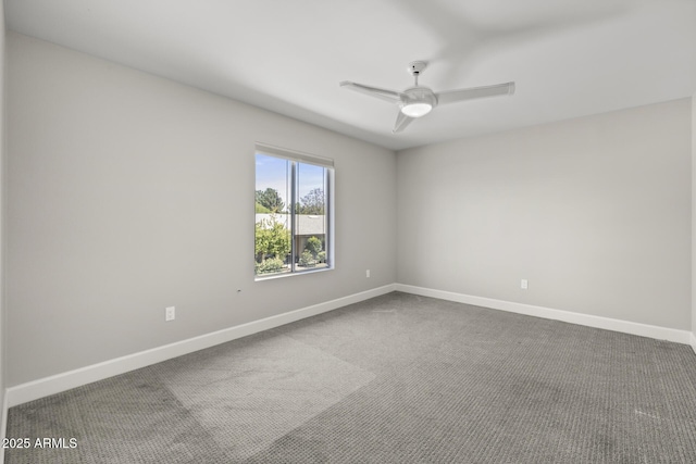 carpeted empty room with ceiling fan