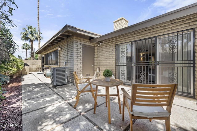 view of patio / terrace featuring cooling unit