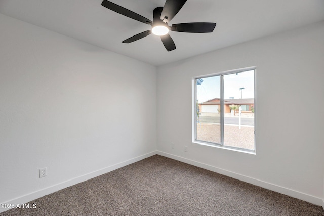 unfurnished room featuring carpet flooring and ceiling fan