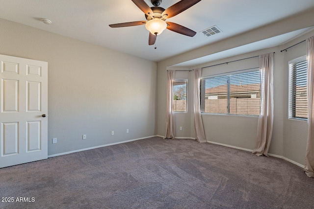 unfurnished room with ceiling fan, carpet flooring, and a healthy amount of sunlight