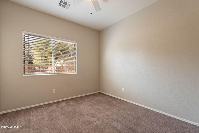 carpeted empty room with ceiling fan