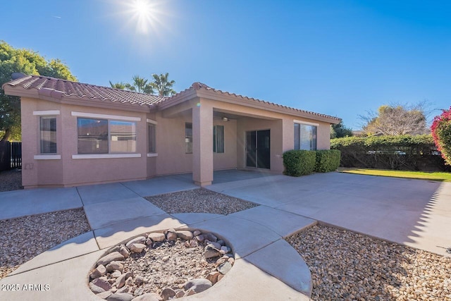 rear view of property with a patio area