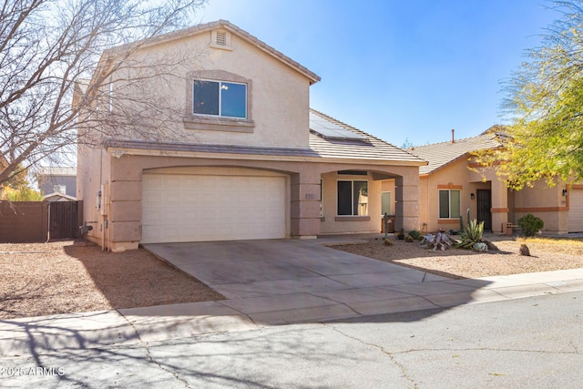 view of front of property with a garage